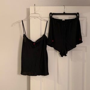 "Sassoon"
Black 2pc Lingerie Set with Red Rosettes
Top - Size M  Pants - Size 6